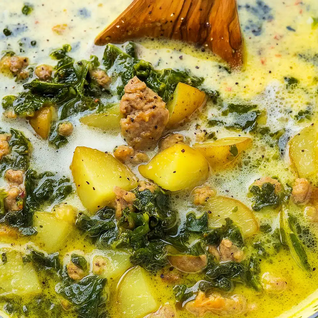 Zuppa Toscana With Potatoes And Sausage 4 Bowl of creamy Zuppa Toscana with Italian sausage, potatoes, and kale